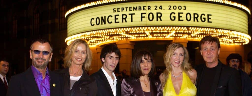 La femme de George Harrison pense que leur fils, Dhani, était " une sorte d'ancre " lors du concert pour George : " En quelque sorte, à travers lui, George était vraiment présent ".