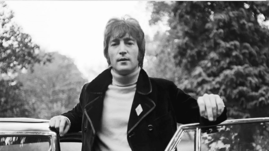 John Lennon renvoyant Pete Shotton du groupe The Quarrymen