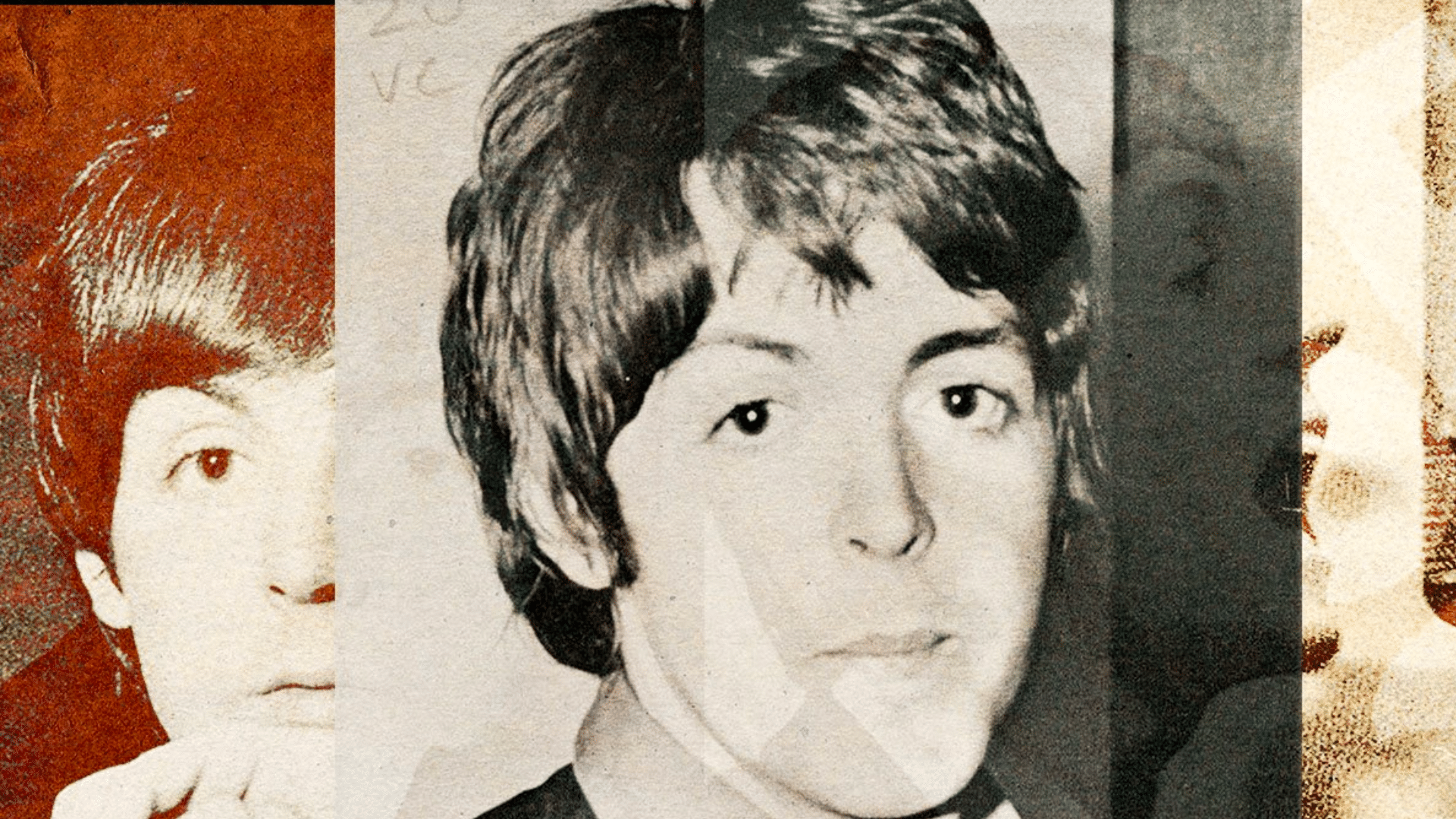 Paul McCartney jouant la guitare sur scène