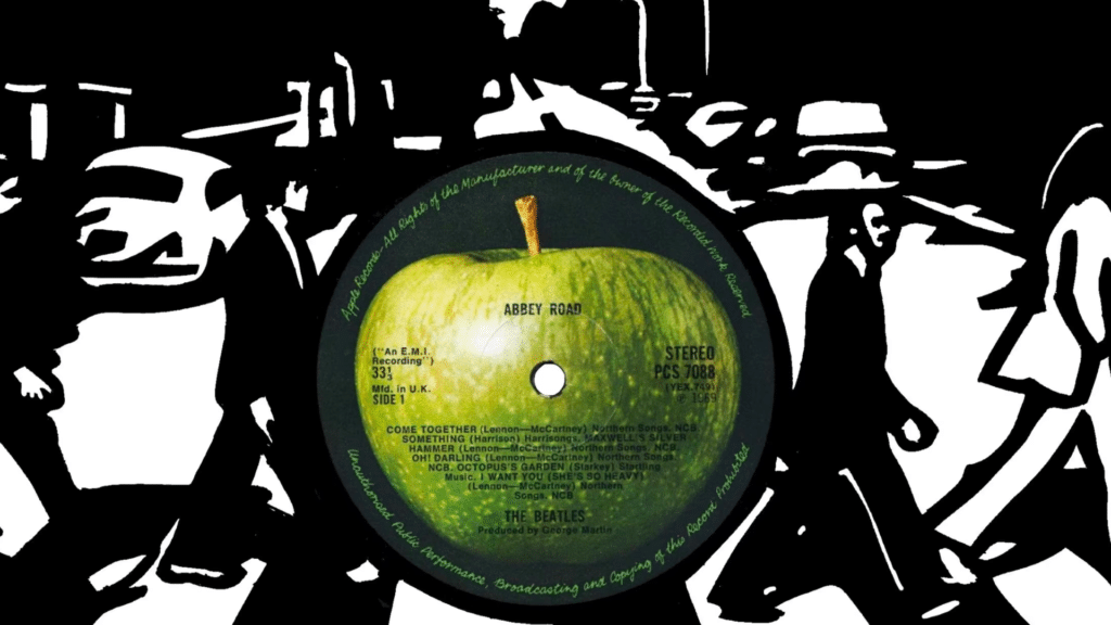 Les Beatles en studio, discutant des faces B de leurs singles