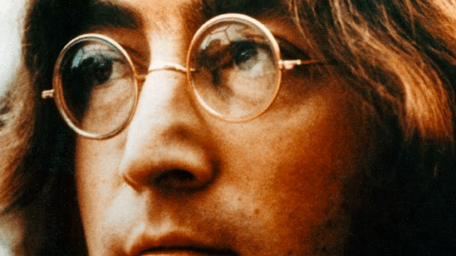 John Lennon et son père se sont réconciliés de manière réconfortante après que Lennon ait prétendument menacé de le faire tuer.
