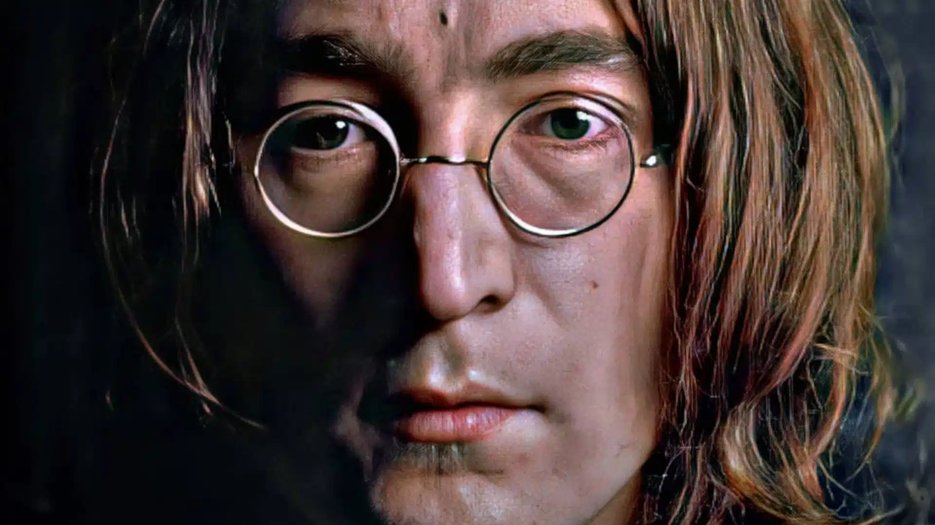 John Lennon jouant la guitare Hofner en studio d'enregistrement, Beatles