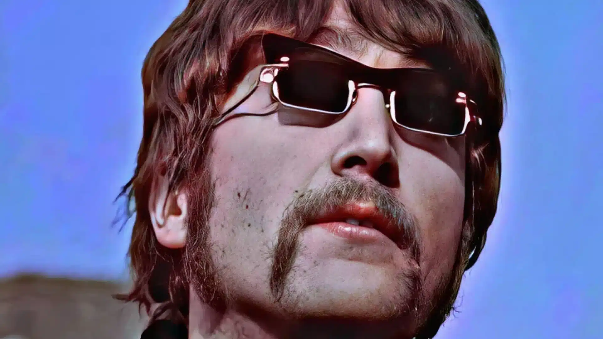 John Lennon en studio avec sa Gibson J160E, lors d'une session de composition