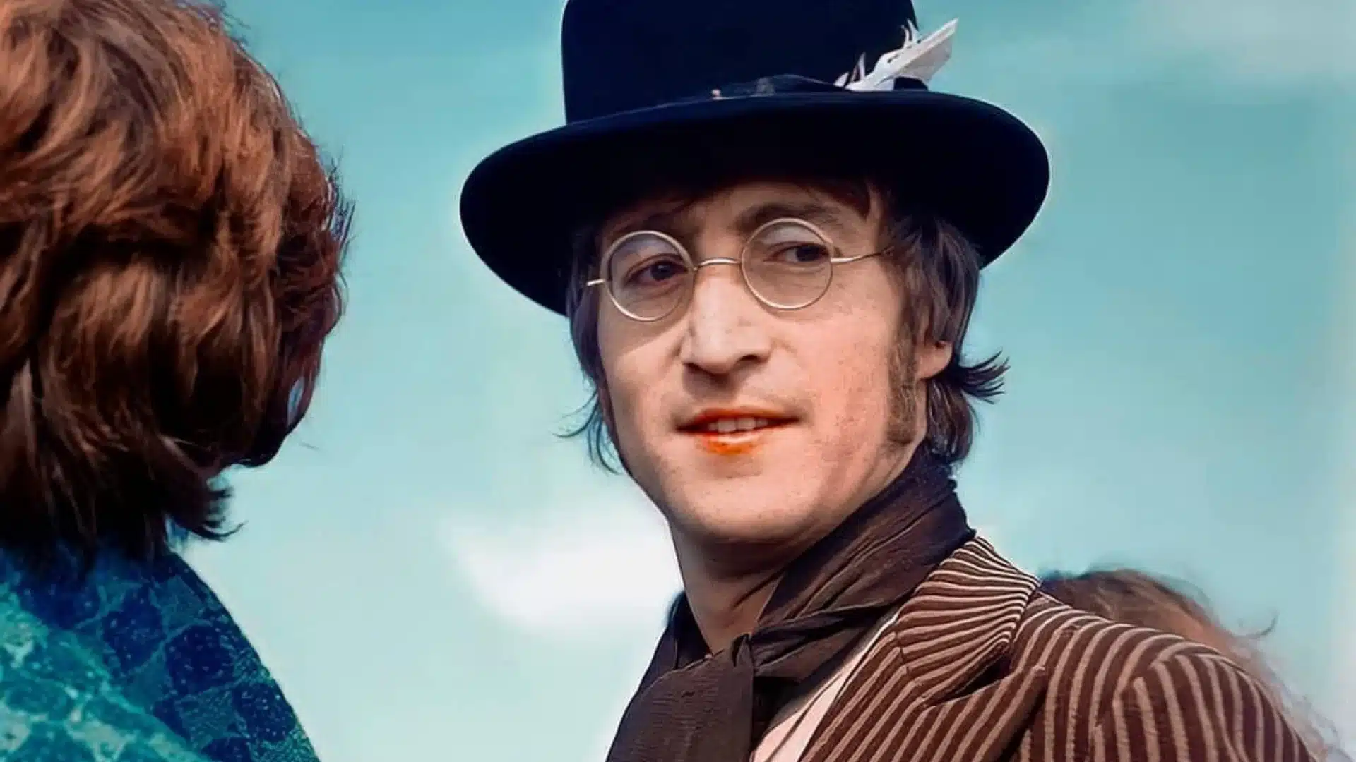 John Lennon et sa légendaire guitare avec les Beatles, une icône du rock
